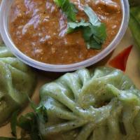 Veggie Momo (5 Dumplings)  · Vegan. Famous Nepalese style steamed veggie dumpling served with tomato and sesame chutney.