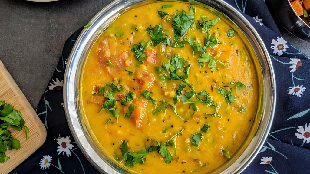 Tarka Daal (Yellow Lentil) · Vegan, gluten free. Combination of yellow and red lentils tempered with garlic, red chilies, turmeric and cumin.