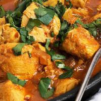 Chicken Vindaloo · Gluten free. Chicken and potato cooked with cumin, turmeric, ginger, garlic and spices.