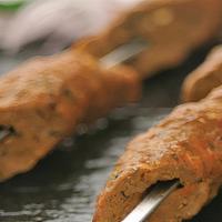 Lamb Seekh Kabab · Gluten free. Ground lamb, ginger, mint, spices skewered in clay oven.