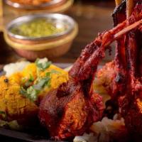 Rack of Lamb · Gluten free. Australian lamb rack marinated in hung yogurt and exotic spices skewered in cla...