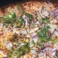 Garlic Chicken Pizza · Dutchman's garlic sauce, red onions, green bell peppers and seasoned chicken strips.