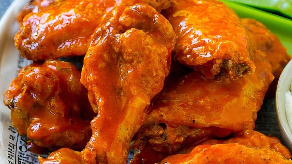Buffalo Chicken Wings · Six homemade chicken wings, served with celery and homemade ranch.
