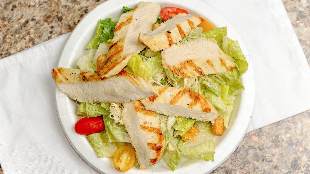 Caesar Salad · Freshly cut romaine lettuce, parmesan cheese, croutons and our creamy Caesar dressing.