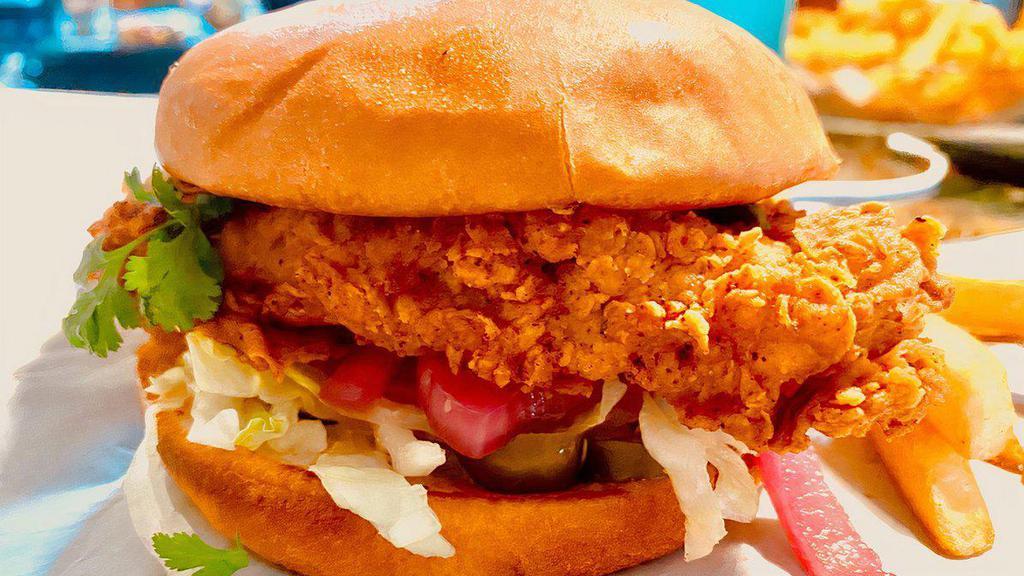 Southern Fried Chicken Sandwich · Our take to a Southern style Fried Chicken, with Chipotle Aioli, Lettuce, Fresh Cilantro,Pickled Jalapeños, Pickled Onions, and Tomatoes, served on a brioche bun.