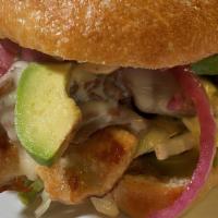 Kick's Torta · Mexican Style Sandwich, with Grilled Chicken, Carnitas, Jack Cheese, Beans, Lettuce, Tomato,...