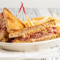 Classic Reuben · Pastrami, swiss cheese, sauerkraut with 1000 island dressing served on rye. Also available w...