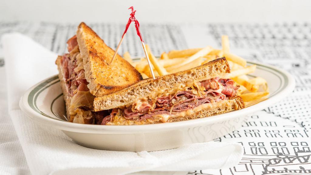 Classic Reuben · Pastrami, swiss cheese, sauerkraut with 1000 island dressing served on rye. Also available with turkey.