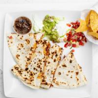 Super Quesadilla · Flour tortilla with melted cheese and our set up of lettuce, guacamole, sour cream and pico ...