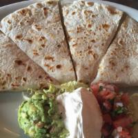 Corn Cheese Quesadilla · Two corn tortilla with melted cheese, topped with lettuce, pico de gallo, sour cream, Mexica...