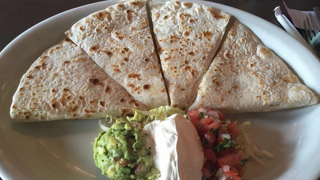 Corn Cheese Quesadilla · Two corn tortilla with melted cheese, topped with lettuce, pico de gallo, sour cream, Mexican cheese and guacamole.