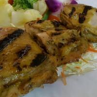 BBQ - Chicken · Grilled chicken leg and thigh in garlic and turmeric served with sweet sauce.