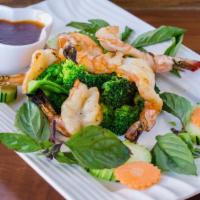 Jumbo Black Tiger Prawns · Mild-medium. Tiger prawns topped with sautéed garlic and covered in sweet and spicy sauce.