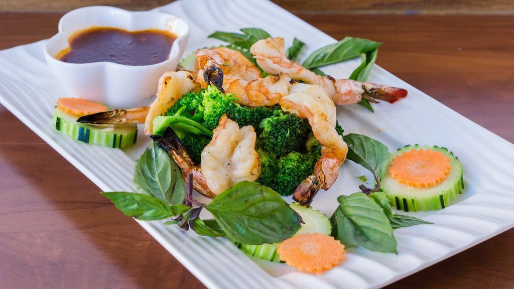 Jumbo Black Tiger Prawns · Mild-medium. Tiger prawns topped with sautéed garlic and covered in sweet and spicy sauce.