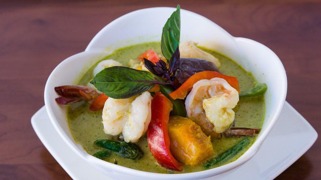 Green Curry · Medium-spicy. String beans, eggplant, bamboo shoots, basil leaves, bell peppers.