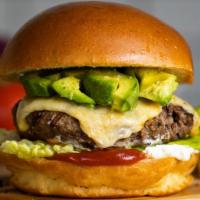Sweet Home Avocado · You'll be mystified by this American beef patty cooked medium and topped with avocado and me...