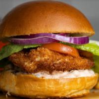 Fried Chicken Twist · Add a twist to the burger with some crispy fried chicken topped with caper aioli, green leaf...