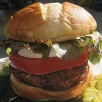 Smells Like Bean Spirits · Love animals? Get a bean patty served in a griddled brioche bun and topped with sliced tomat...
