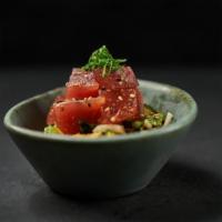 Tuna Poke · Tuna, cucumbers, avocado, onions, wakame, and sweet and spicy sesame dressing