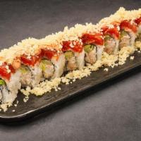 Sunset · House crab, avocado, cucumber, topped with spicy tuna, spicy aioli and tempura flakes. 8 pcs.