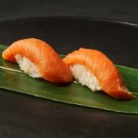 Nigiri Coho Salmon · Served two ways, yakumi, yuzu mango, serrano, sea salt or neat, served without toppings. 2 p...