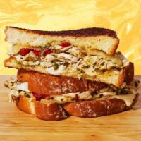 Chicken Pesto Grilled Cheese · This will have you like *kisses fingertips like an Italian chef.* Melty jack and swiss chees...