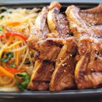 Galbi Combo · Beef short ribs 
+ white rice  
+ Jap Chae (clear yam noodle w/ vegetables)
+ Soup (beef tof...