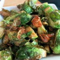 Crispy Brussels Sprouts · Crispy garlic, salt, and pepper spices.