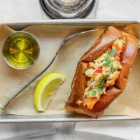 Lobster Roll · Tarragon butter, sea salt, brioche bun.