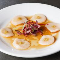 Hokkaido Scallop Carpaccio · Yuzu Kosho, ponzu, EVOO, smoked salt.