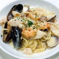 Seafood Pasta · Mussels. Clams. Shrimps. Salmon(choice Tomato Sauce or Pink Sauce or Creamy Sauce)