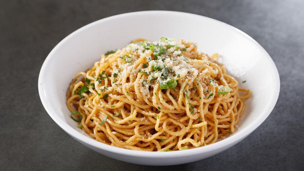 Garlic Noodles · Garlic butter, Parmesan cheese.