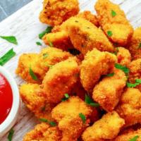 Chicken Nuggets · 10 pieces of deep-fried juicy and golden chicken nuggets.