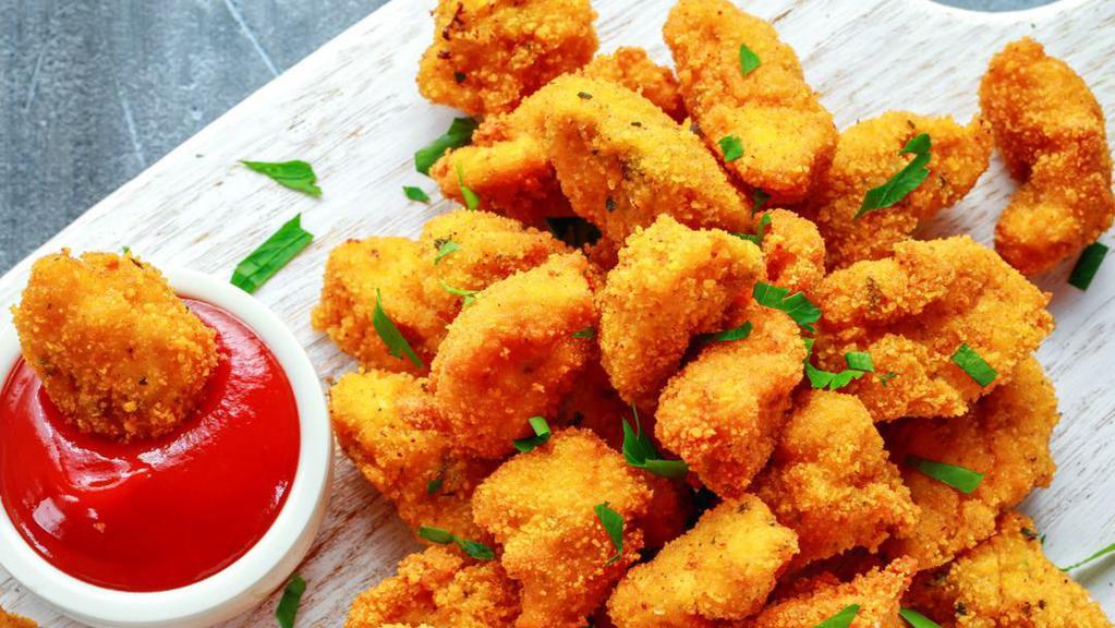 Chicken Nuggets · 10 pieces of deep-fried juicy and golden chicken nuggets.