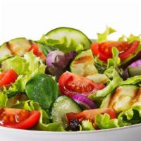 Greek Salad · House-made salad that includes lettuce, feta cheese, tomatoes, kalamata olives, and pepperon...