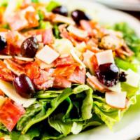 Chef's Salad · Chef's special salad includes lettuce, salami, pepperoni, tomatoes, and cheese.