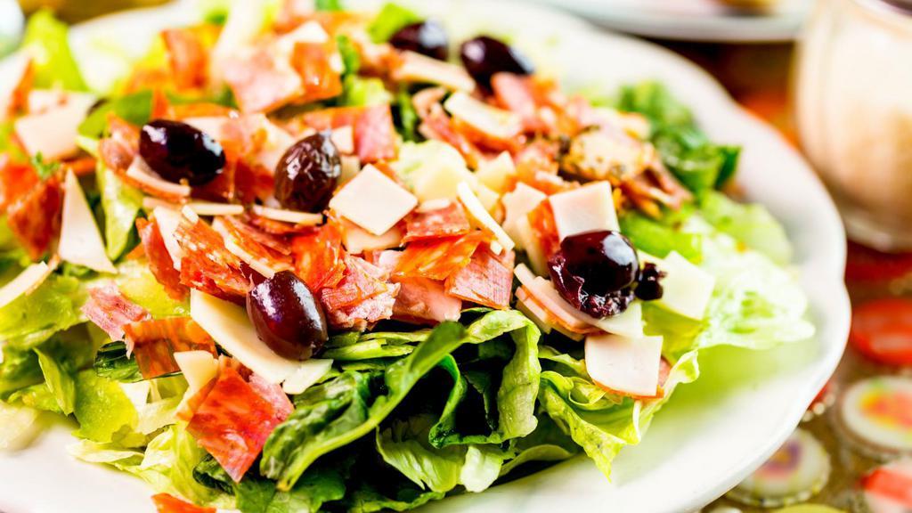Chef's Salad · Chef's special salad includes lettuce, salami, pepperoni, tomatoes, and cheese.