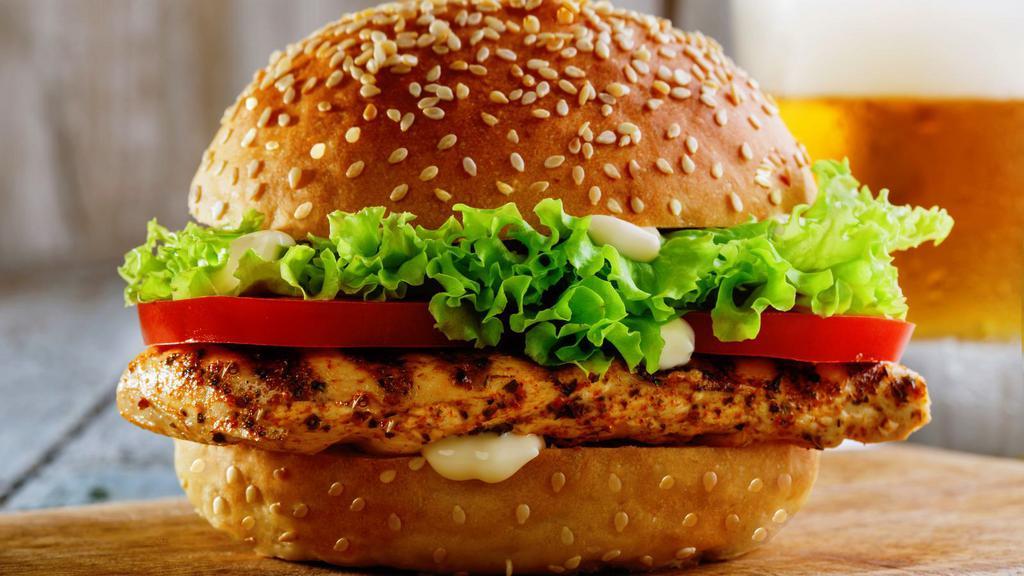 Grilled Chicken Burger · Juicy grilled chicken breast with mild cheddar cheese, tomatoes, onions, lettuce, mayonnaise, and mustard.