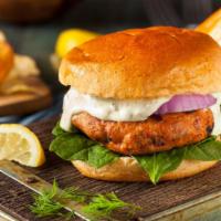 Salmon Burger · Elegant Alaskan salmon patty burger with mild cheddar cheese, tomatoes, onions, lettuce, may...
