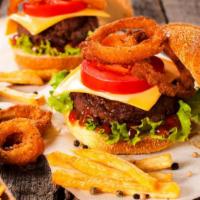 Onion Ring Cheese Burger · Crispy onion ring cheeseburger that includes 1/3 pound beef patty, mild cheddar cheese, deep...