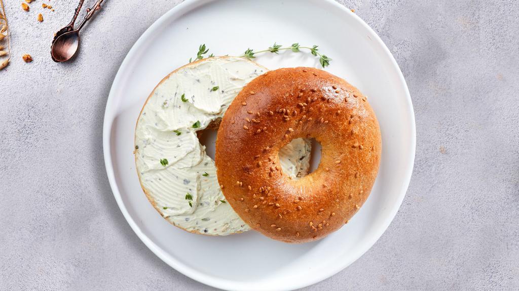 Flavored Cream Cheese Bagel · Freshly baked bagel with your choice of flavor cream cheese.