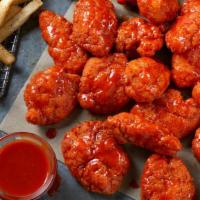 24 Boneless Wings · 24 Boneless Wings tossed in your choice of sauce,  served with seasoned fries and your choic...