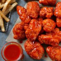 18 Boneless Wings · 18 Boneless Wings tossed in your choice of sauce, served with seasoned fries and your choice...