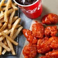 Boneless Wings Combo · 12 Boneless Wings tossed in your choice of sauce,  served with seasoned fries and a Fountain...