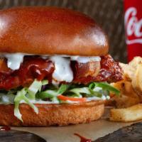 The Fried Spicy Slammer Combo · Chicken breast, crispy golden brown, tossed in Nashville Hot sauce, bacon, Ranch, pickled ja...