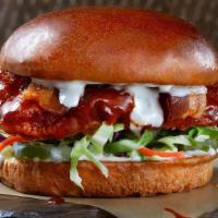 The Spicy Fried Slammer · Chicken breast, crispy golden brown, tossed in Nashville hot sauce, topped with bacon, ranch...