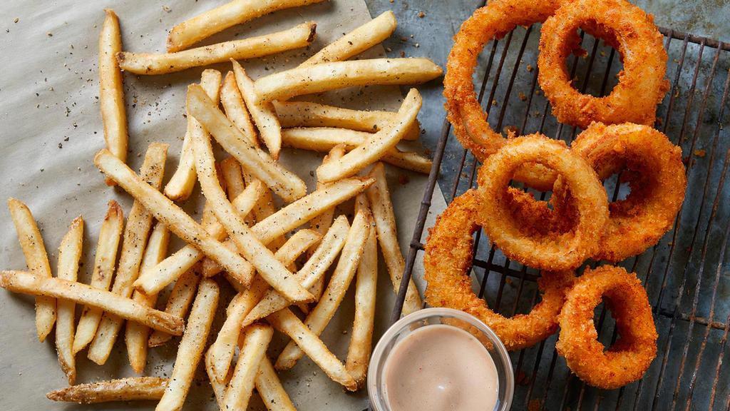Cellmates · Our Jumbo Cajun-Seasoned Onion Rings and Seasoned Fries. These partners in crime are a notorious combo. Served with ketchup and BBQ Ranch.