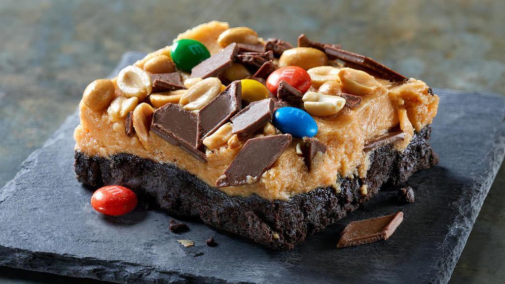 Felony Fudge · It would be criminal to pass these up. Creamy peanut butter & M&M bars layered atop an OREO Cookie crust.