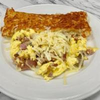 MEAT LOVERS · Ham, bacon, sausage, onion, jack and white cheddar, hash browns, pancakes or toast.