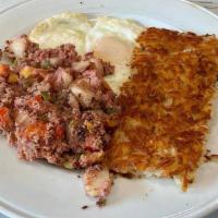CORNED BEEF HASH · From scratch! Tender corned beef brisket, diced potatoes, bell peppers, onions, two eggs any...
